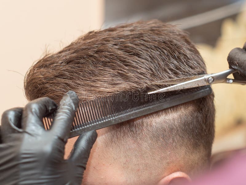 Males Hair Cutting with Comb and Scissors, Close Up View. Hairstylists  Hands in Black Rubber Gloves Cutting Hair with Stock Photo - Image of  hairstyle, clipper: 156753036