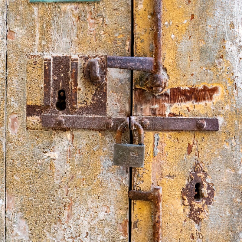 Old Locks and Rusty Bolts on a Door Stock Image Image of colorfull