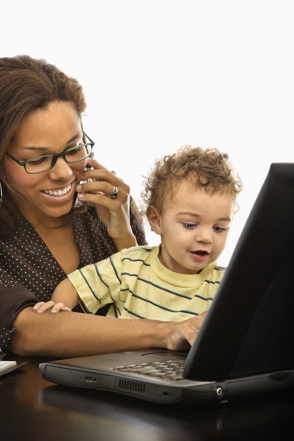 Maman d'affaires avec l'enfant. photos stock Maman d'affaires avec l'enfant. photos stock