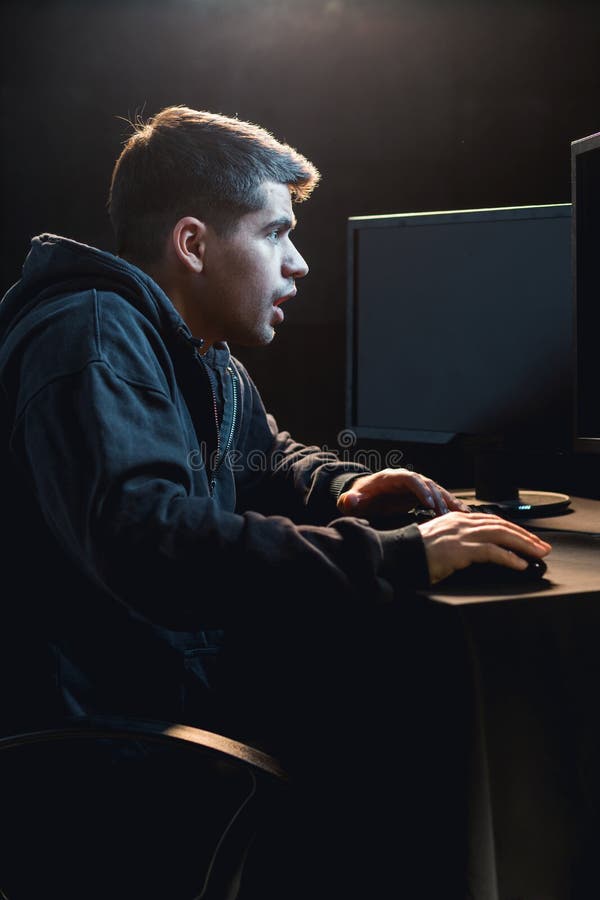 Man addicted to computer games royalty free stock photos