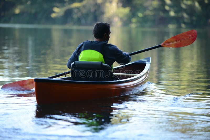 Man Alone on a Beautiful Lake on a Kayak Stock Photo Image of alone