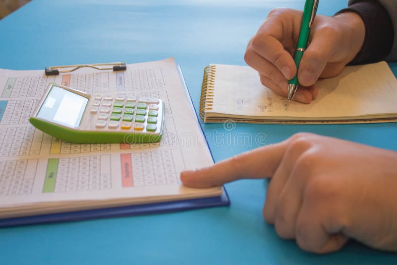 Man Analyzing Statistics Financial Concept. The calculators, business owners, accounting and technology stock photo Man Analyzing Statistics Financial Concept. The calculators, business owners, accounting and technology stock photo