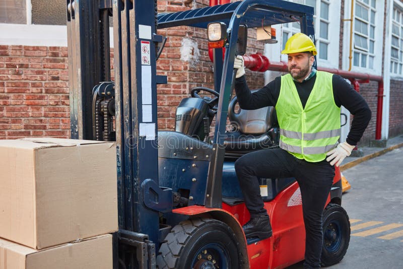 Forklift Driver Stands in Front of His Forklift Stock Image Image of