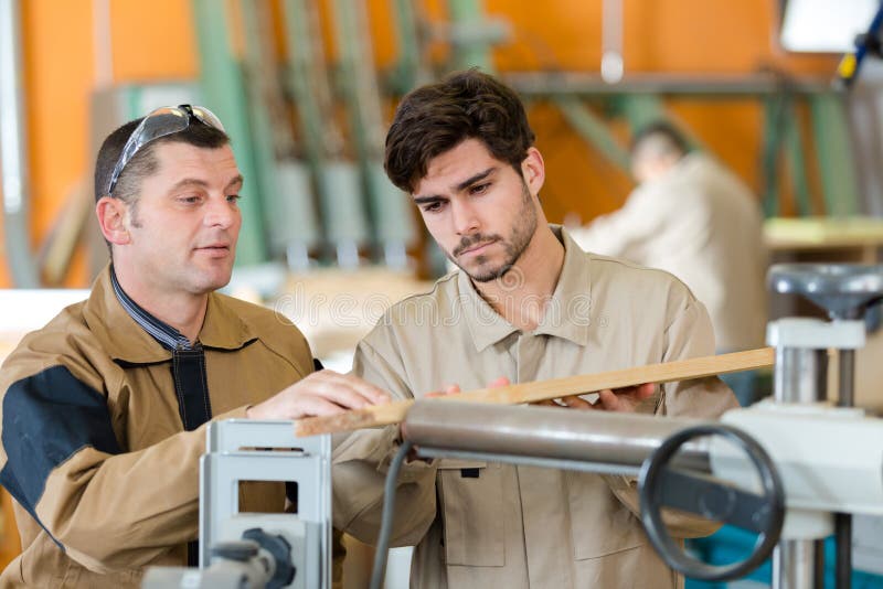 Man as wood apprentice stock image. Image of joiner 186145013