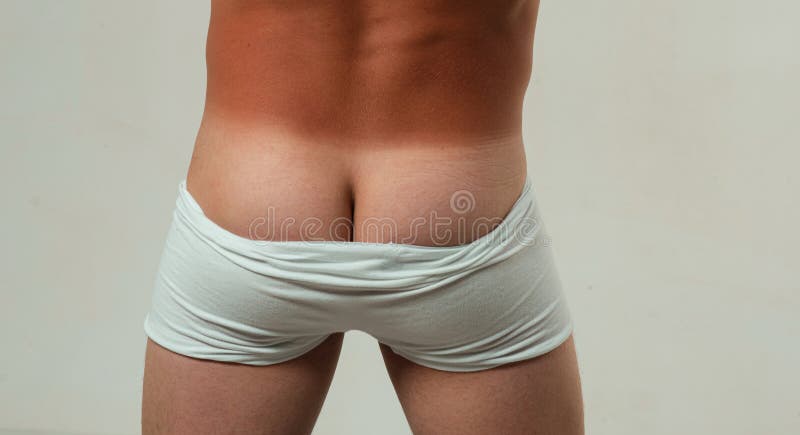 Man Tan. Male Underwear. Gay Panties Down. Mans Naked Buttocks. Stock Image  - Image of nude, breeches: 270889543