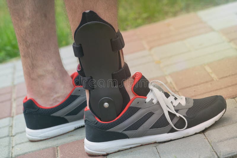 Man wearing ankle brace stock image. Image of protection - 179277687