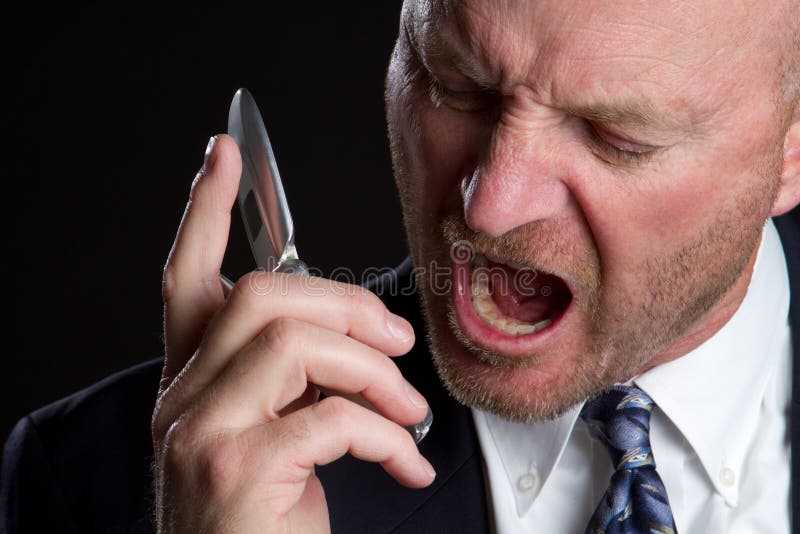 Angry man screaming on phone. Angry man screaming on phone