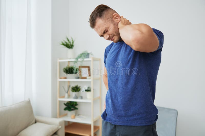 Man back neck and shoulder pain, inflammation of muscles and ligaments rupture during sports, inflammation and injury. Man exercised stock images, royalty-free photos and pictures