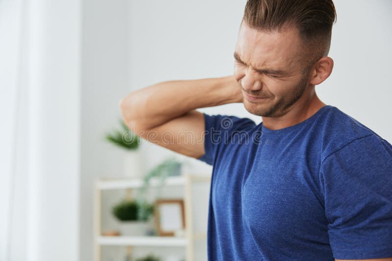 Man back neck and shoulder pain, inflammation of muscles and ligaments rupture during sports, inflammation and injury. Man exercised stock images, royalty-free photos and pictures
