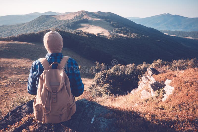 Man with backpack on mountains road royalty free stock photos Man with backpack on mountains road royalty free stock photos