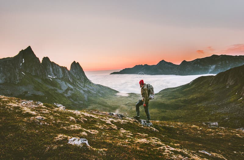 Man backpacker hiking in mountains alone outdoor royalty free stock photography Man backpacker hiking in mountains alone outdoor royalty free stock photography