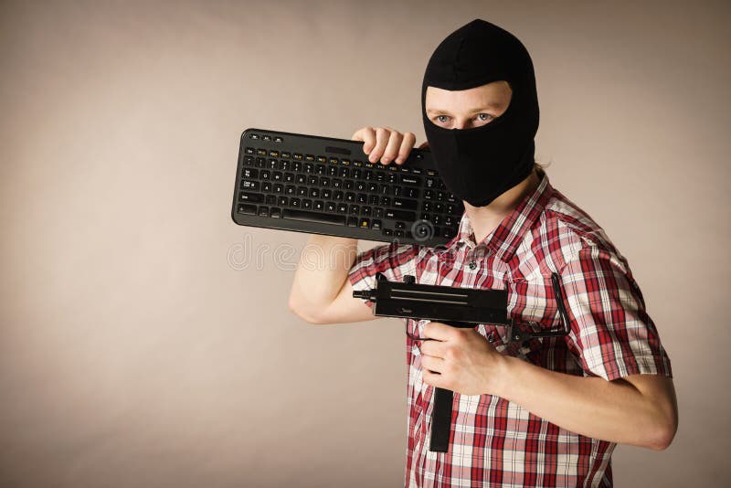 Man in Balaclava Holding Keyboard and Gun Stock Photo - Image of keyboard,  agressive: 135795700