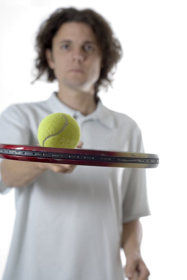Man Balancing A Tennis Ball Vertical Picture. Image 5801079