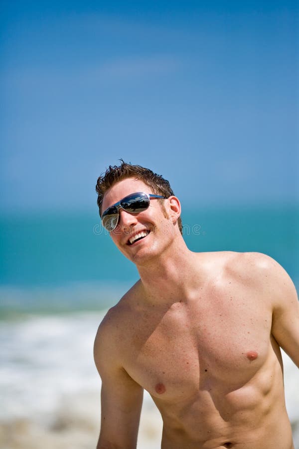 man at the beach with shades