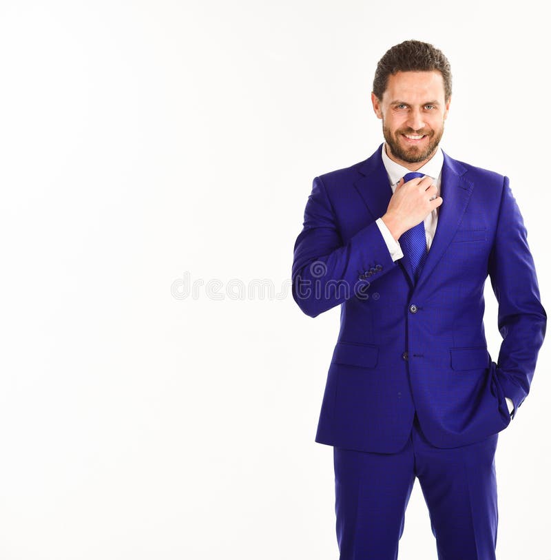Man with beard and smiling face touches his tie. royalty free stock photo Man with beard and smiling face touches his tie. royalty free stock photo
