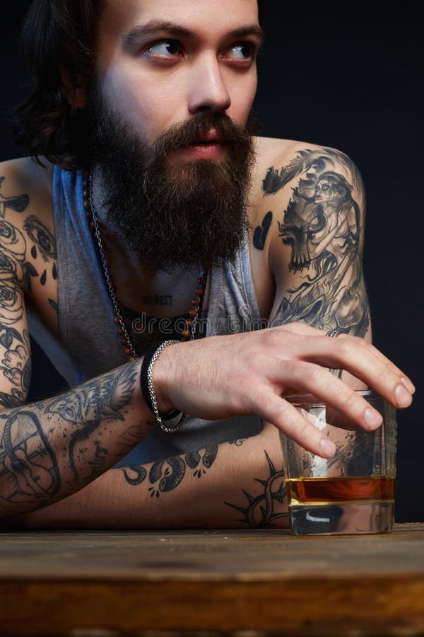 Man with Beard and Tattoo. with Glass of Whiskey Stock Photo - Image of  glass, looking: 158874784