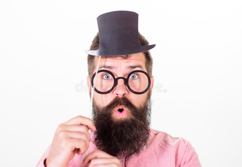 Man bearded hipster hold cardboard top hat and eyeglasses to look smarter white background. Signs someone is smarter