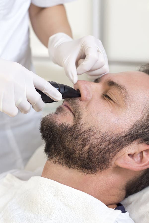 Man in a Beauty Salon during a Nose Hair Removal Surgery Stock Photo - Image of cream, hair: 132791356 Man in a Beauty Salon during a Nose Hair Removal Surgery Stock Photo - Image of cream, hair: 132791356