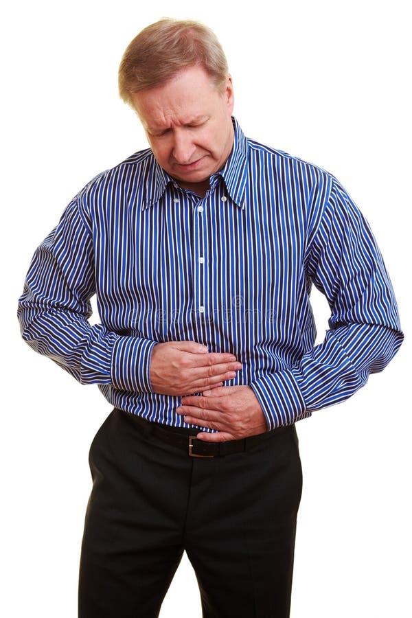Elderly man holding his hands over his aching stomach. Spasm ache stock images, royalty-free photos and pictures