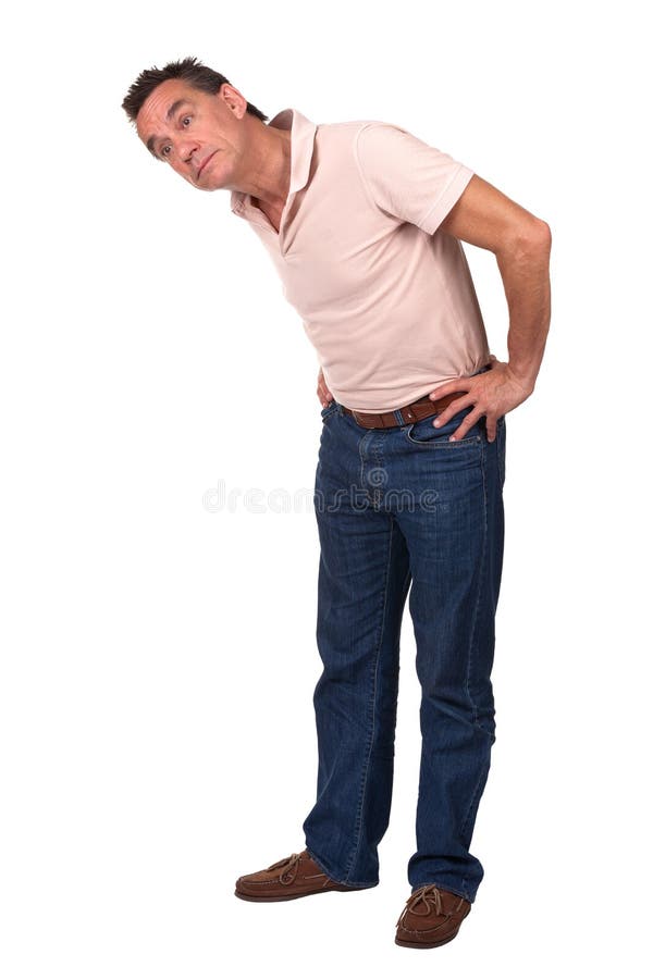 Man Bending Sideways To Look at Something Stock Photo Image of jeans