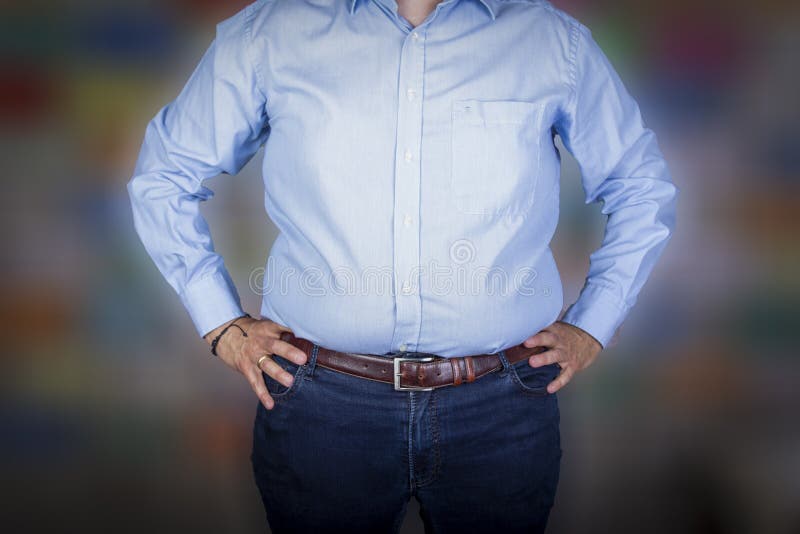 Man with a Big Belly Wearing a Shirt and Jeans Stock Photo Image of