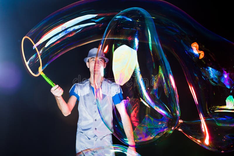 Man with big soap bubbles stock photo. Image of cute 47592134