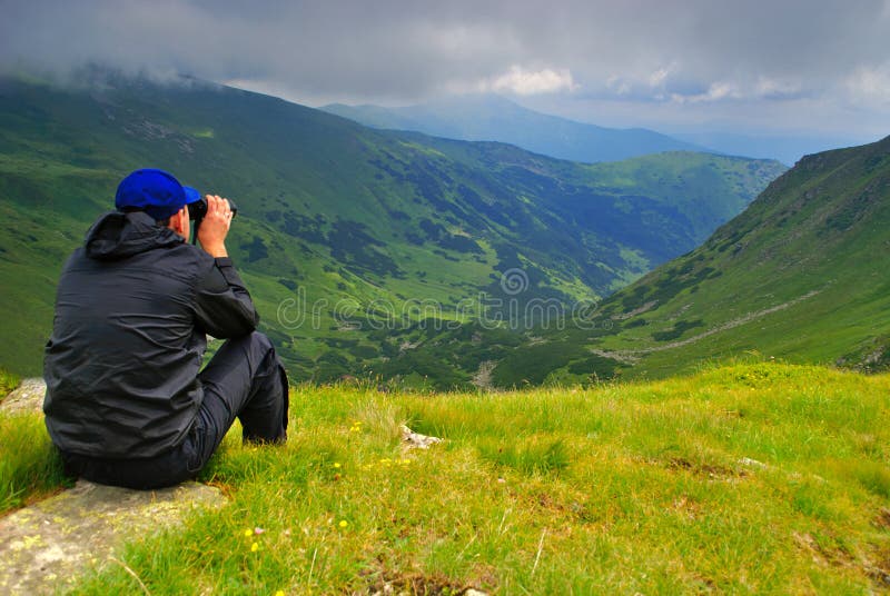 Man with binoculars