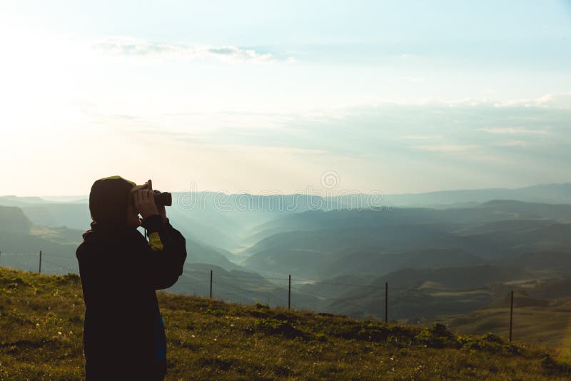 Man Binoculars Looking Caucasian Mountain view Cloudscape Traveling Concept