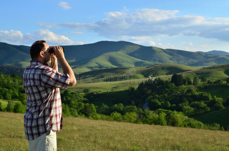 Man with Binoculars on Summer Day royalty free stock images Man with Binoculars on Summer Day royalty free stock images