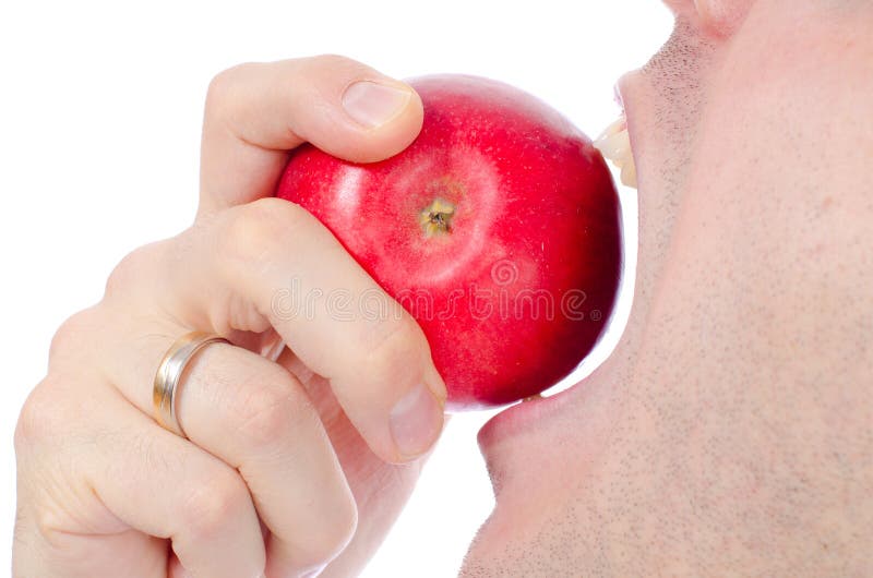 Man Biting red apple