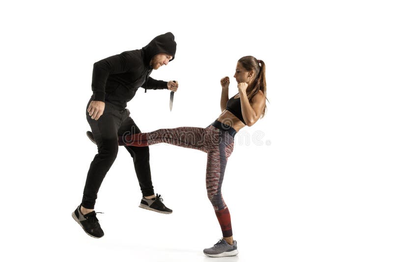 Man And Woman Fighting In Studio Women S Self Defense Concept Stock Photo Image Of Exercise Female