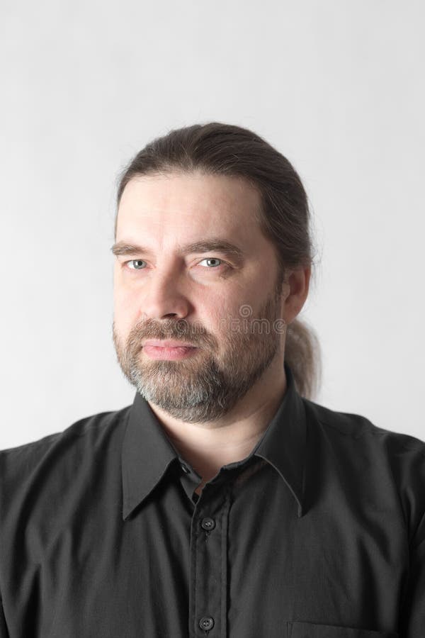 Man in a black shirt stock photo. Image of males, closeup - 55879722