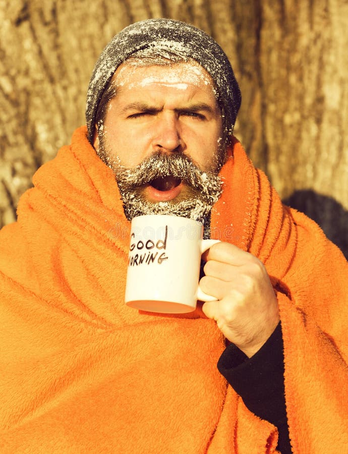 Man in blanket with cup stock photo. Image of covered - 167554742