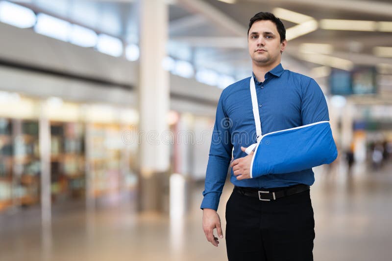 Man with Broken Arm in Airport Stock Image Image of risk, therapy