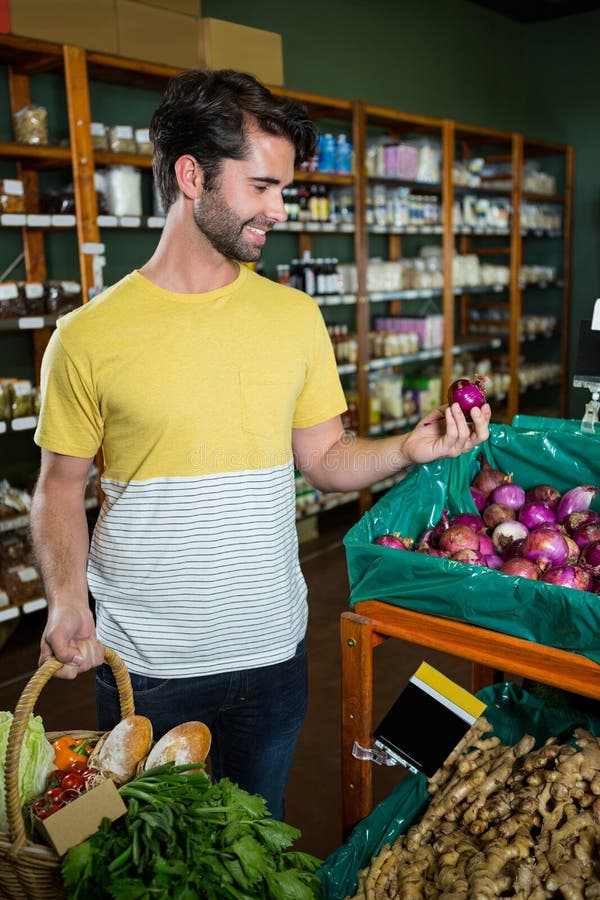 Man Buying Onion in Supermarket Stock Photo - Image of cheerful ...