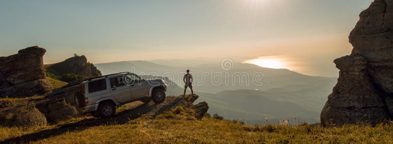 Man with car on beauty nature landscape background royalty free stock photography Man with car on beauty nature landscape background royalty free stock photography