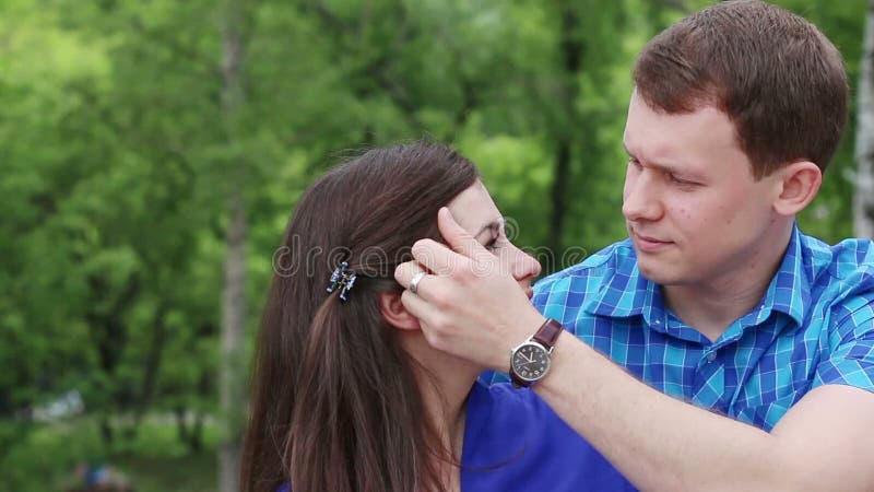 Man Caresses Woman and Strokes Her Hair Outdoor Stock Footage - Video of blur, male: 56462056 Man Caresses Woman and Strokes Her Hair Outdoor Stock Footage - Video of blur, male: 56462056