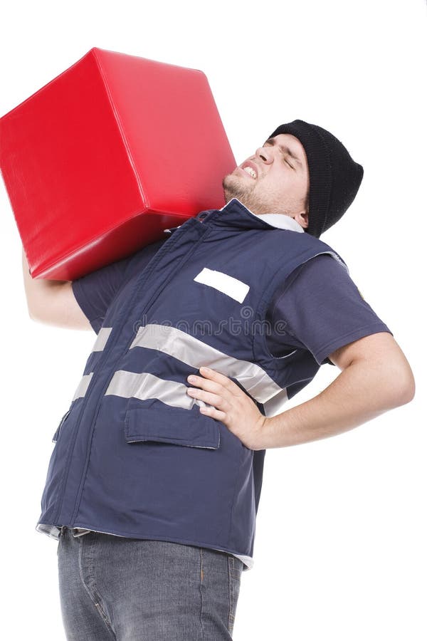 Man carrying red cube