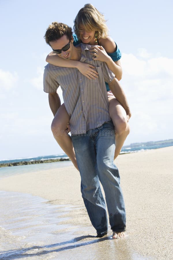 Man carrying woman. royalty free stock images