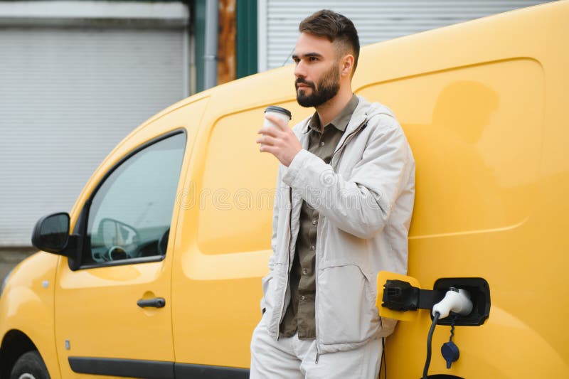 Man Charging Electric Car by the Work Stock Image Image of supply