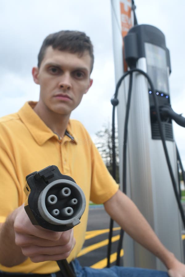 Man Charging His Electric Vehicle Stock Image Image of battery
