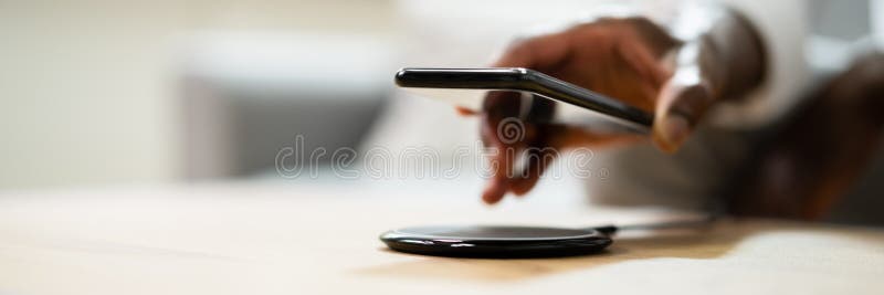 Man Charging Smartphone Using Wireless Charging Pad Stock Image Image Of Percentage Gadget