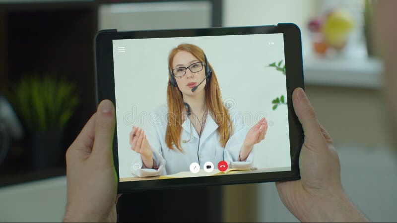 Person hold tablet device talk speak on video call online with