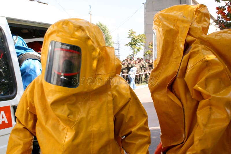 Man in chemical suit stock images