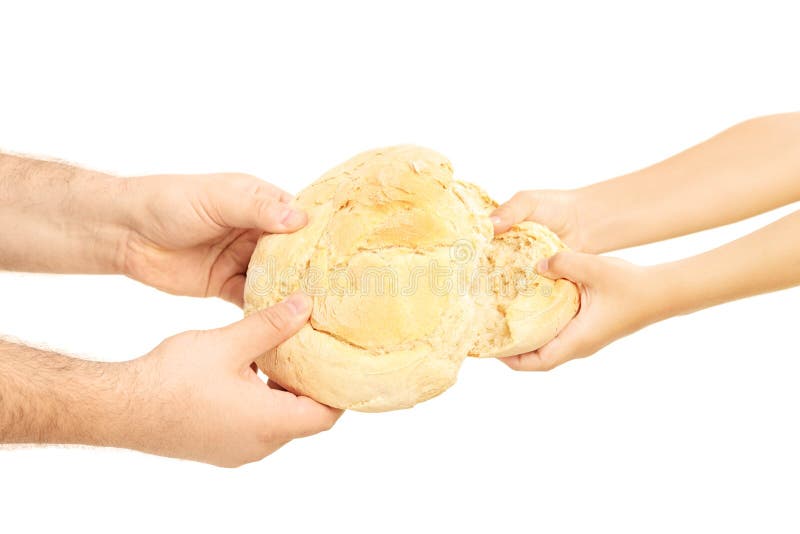 Man and child breaking apart a bread loaf royalty free stock images Man and child breaking apart a bread loaf royalty free stock images