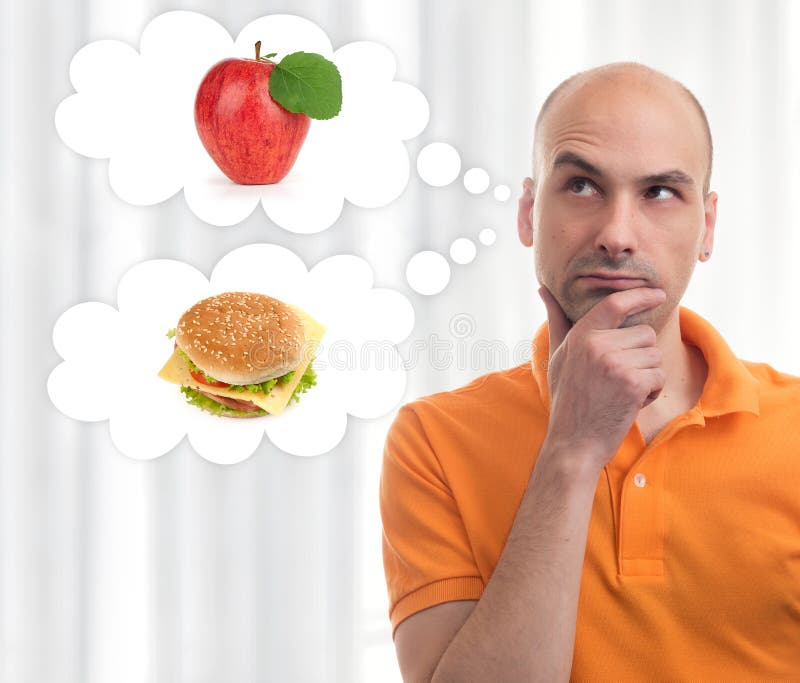 Man choosing between apple and sandwich