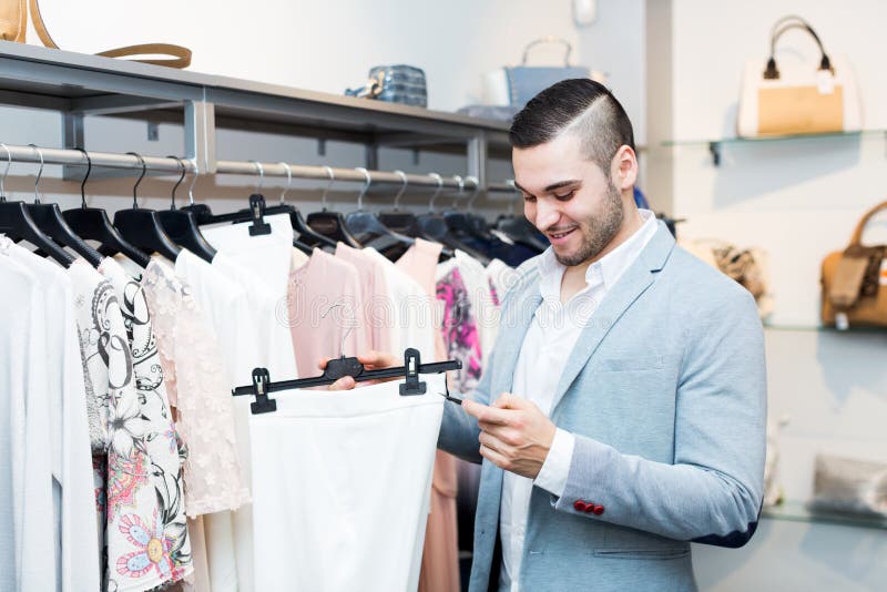 Man Choosing New Female Garment Stock Image - Image of buyer, client ...