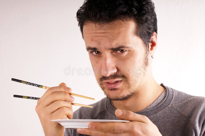 Man with chopstick stock photo. Image of happy, male 49845176