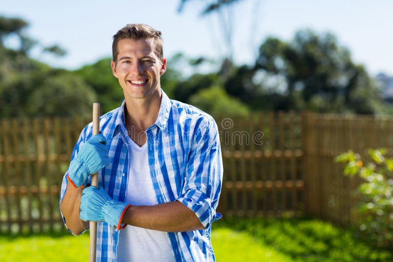 Man cleaning home garden royalty free stock photos