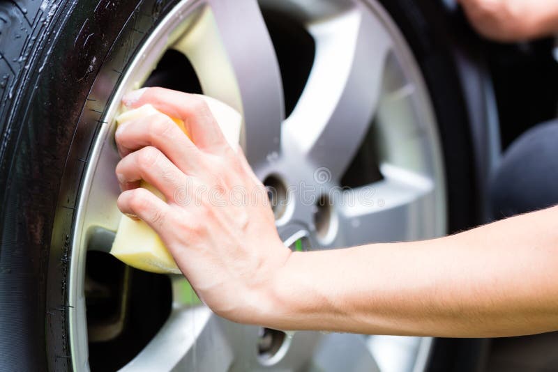Man Cleaning Wheel Rim while Car Wash Stock Image Image of handsome